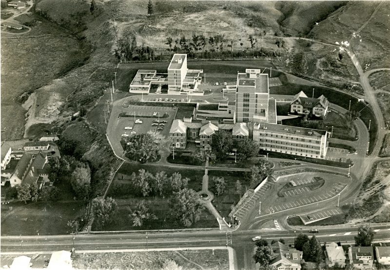 KMA Photo 10428: The hospital expansion, showing the new and old residences, [November 28, 1985].